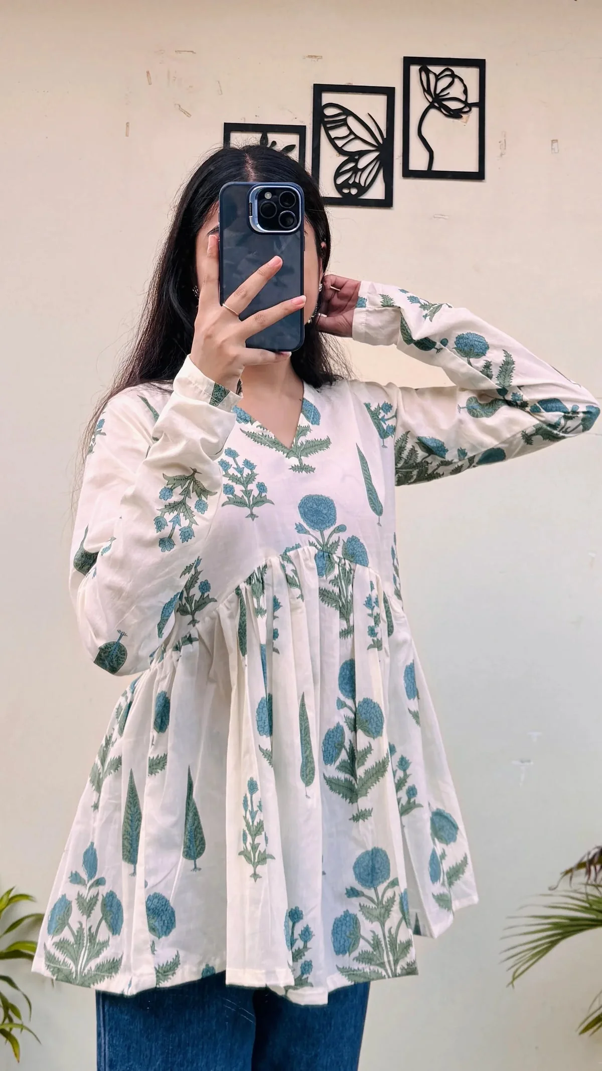 rn-image_picker_lib_temp_8f5dda21-e8ad-4cf2-978f-6f0f06b34843.webp Cotton White Flared Printed Aliacut Peplum Top - Image 1