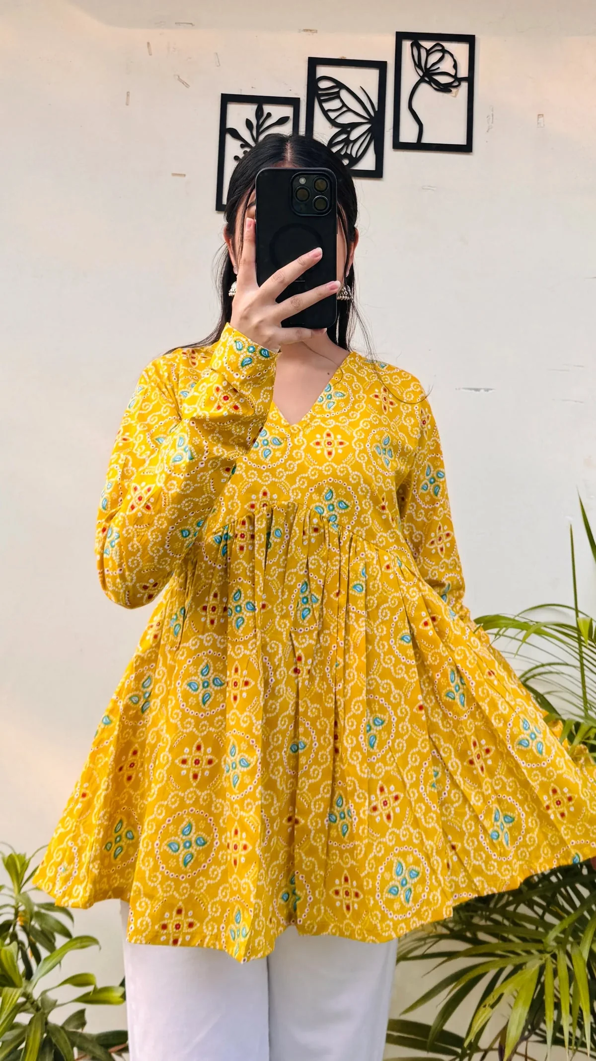 rn-image_picker_lib_temp_ea77e713-89f9-49fc-9d95-a4e02f276bd3.webp Cotton Yellow Flared Printed Aliacut Peplum Top - Image 1